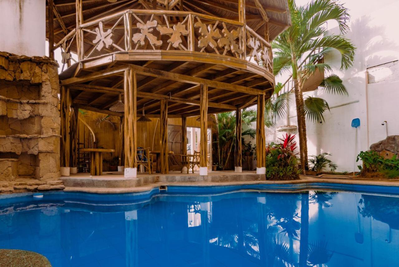Hostal Poseidon Puerto Cayo Extérieur photo