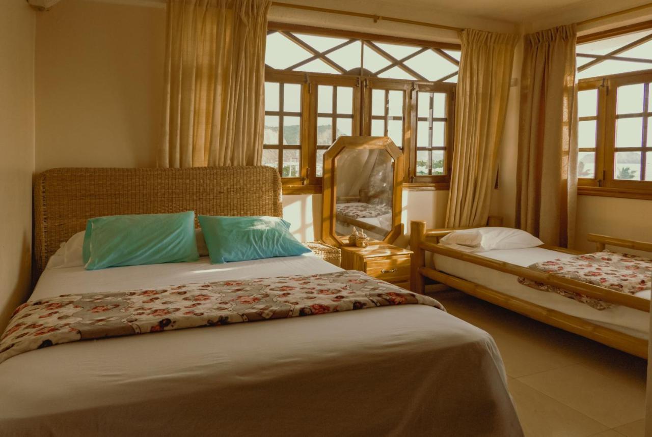 Hostal Poseidon Puerto Cayo Extérieur photo