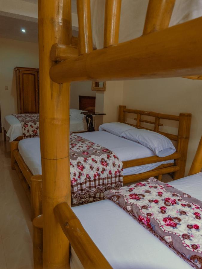 Hostal Poseidon Puerto Cayo Extérieur photo
